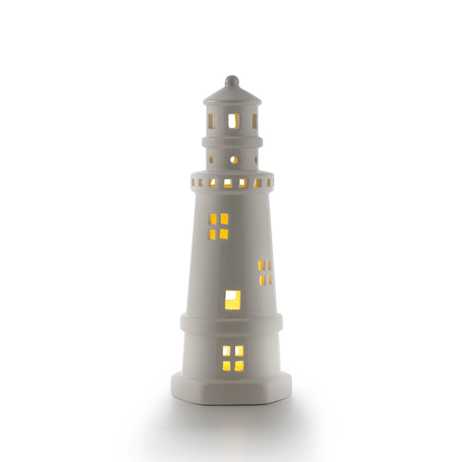 Stilfullt hvitt fyrtårn LED-lys fra Porsgrunds Porselænsfabrik, rettet mot å skape en koselig atmosfære med sitt maritimt inspirerte design.