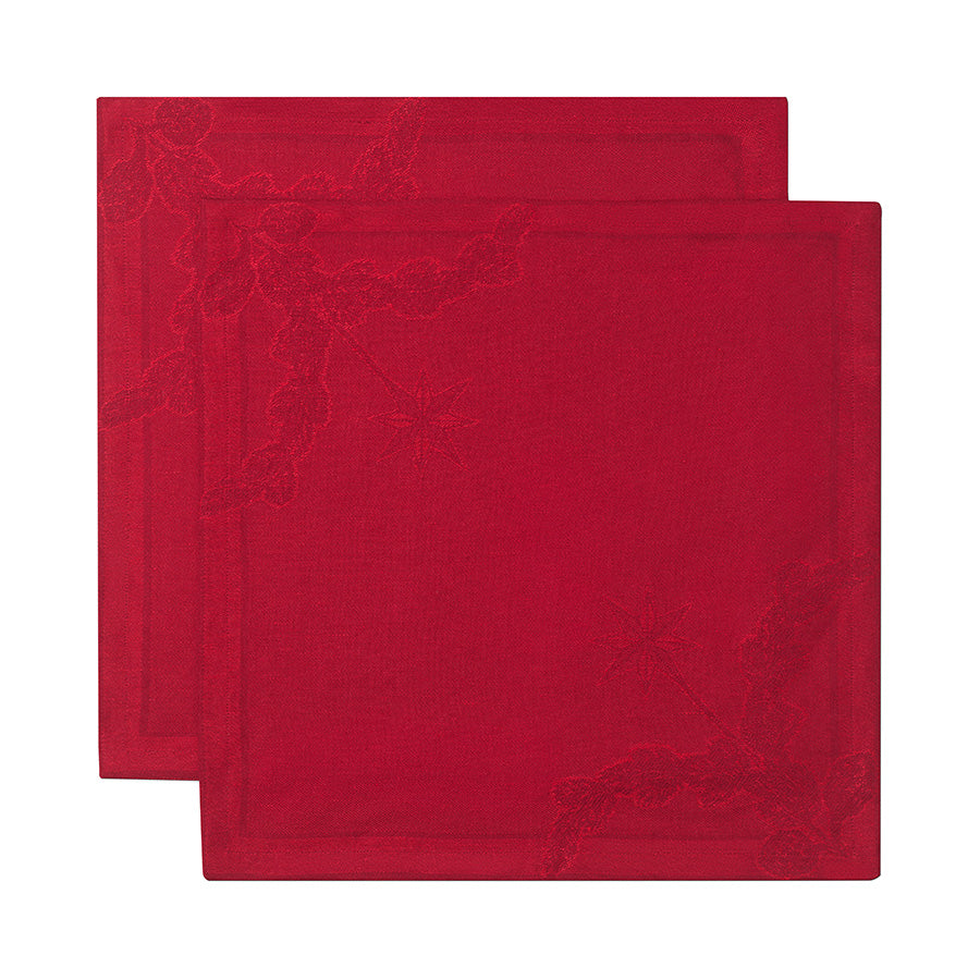 Røde stoffservietter fra Royal Copenhagen, sett av to, med klassiske julemotiver av hjerte og stjerne. Mål 45x45 cm.