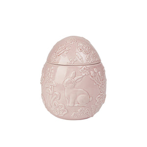 Dekorativt rosa påskeegg i porselen med relieff av blomster og hare, perfekt for påskepynt og oppbevaring.