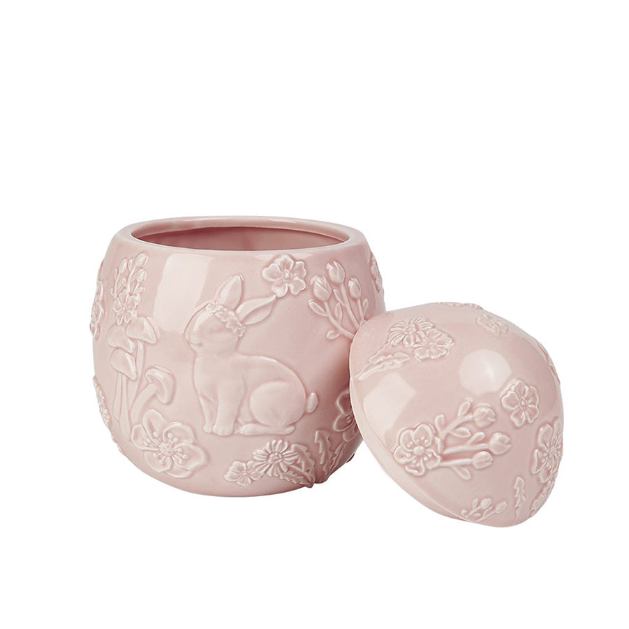 Rosa påskeegg i porselen med lokk, detaljert med blomster og en hare, ideelt for påskegodt og småkaker.