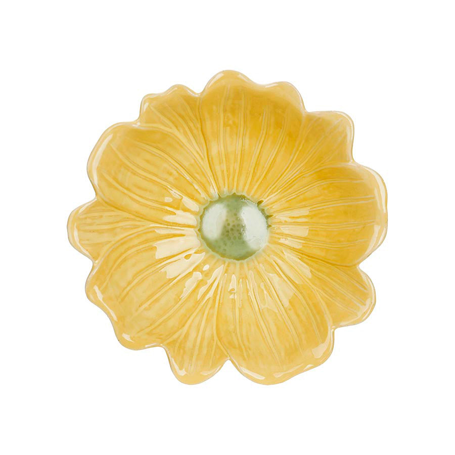 Oversiktsbilde av en gul blomsterformet serveringsskål med detaljerte kronblad, ideell for vårdekorasjoner.
