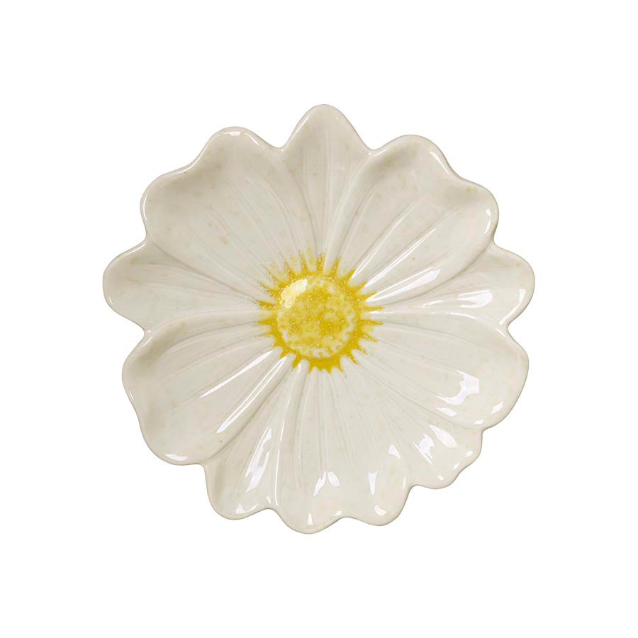 Blomsterformet tallerken med hvit glasur og gult midtpunkt, perfekt for borddekking.