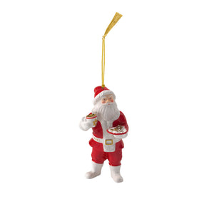 Villeroy & Boch julenisse 2025, en samlerfigur i porselen med varme farger, holder en kopp kakao og et fat småkaker, perfekt som juletrepynt.