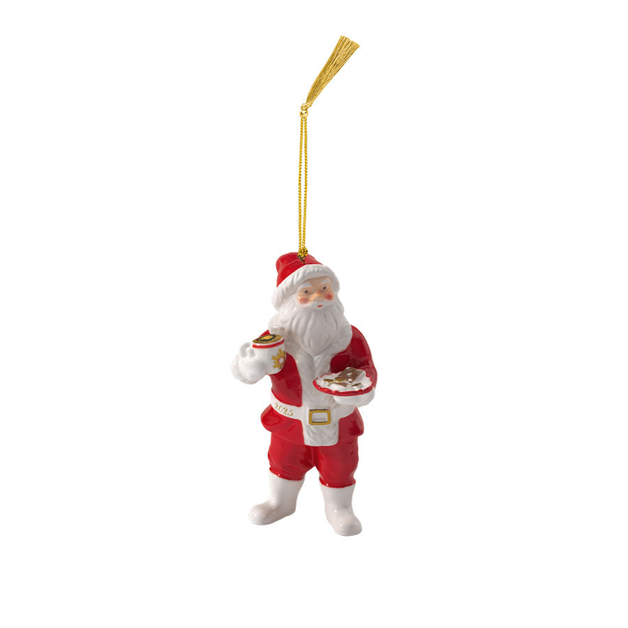 Villeroy & Boch julenisse 2025, en samlerfigur i porselen med varme farger, holder en kopp kakao og et fat småkaker, perfekt som juletrepynt.
