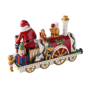 Bakside av Villeroy & Boch lokomotiv figur med julenisse, gaver og bamser, fremhevet med  høykvalitets porselen og detaljer.