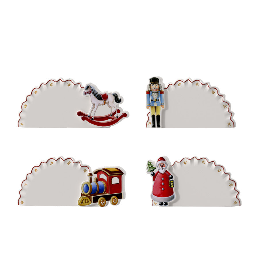 Bordkortholdere i porselen fra Villeroy & Boch Toy's Delight med gyngehest, nøtteknekker, lokomotiv og julenisse