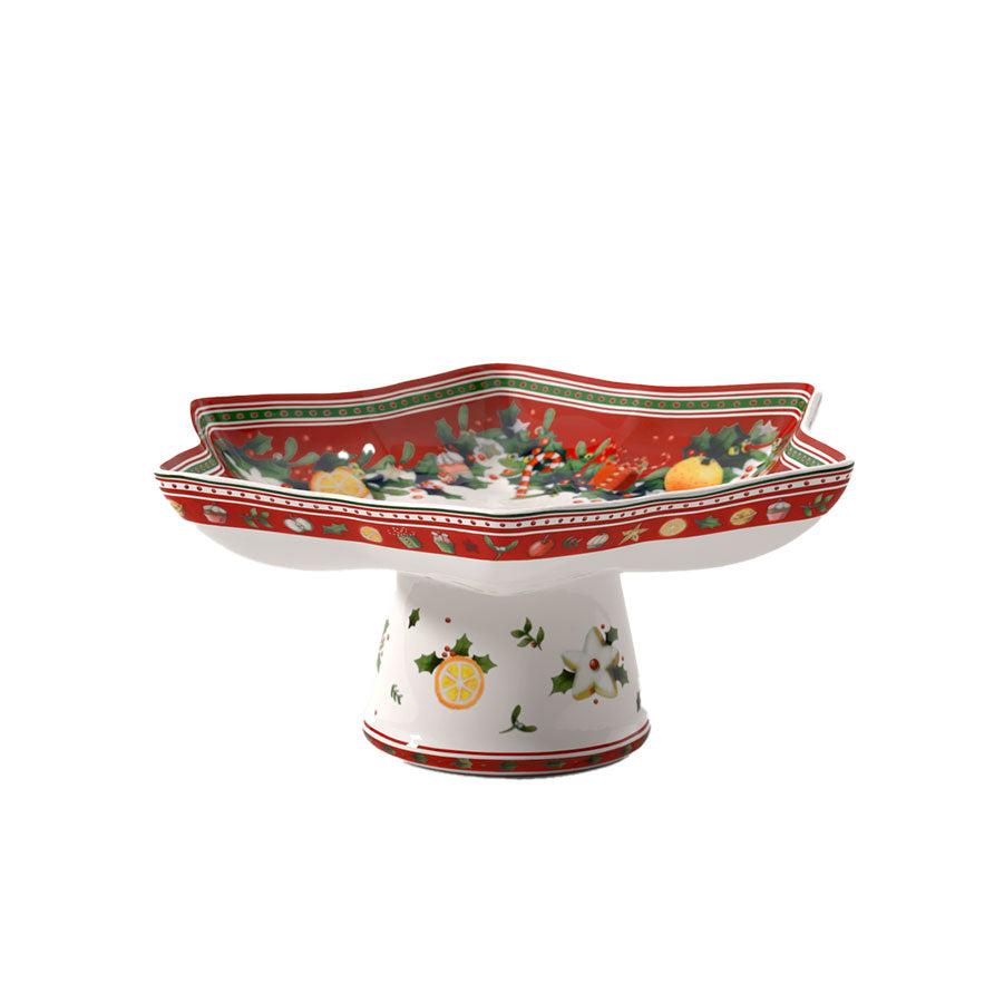 Villeroy & Boch serveringsbolle med stett i stjerneform, dekorert med julemotiver som frukt og bær, perfekt for servering av småkaker og konfekt.