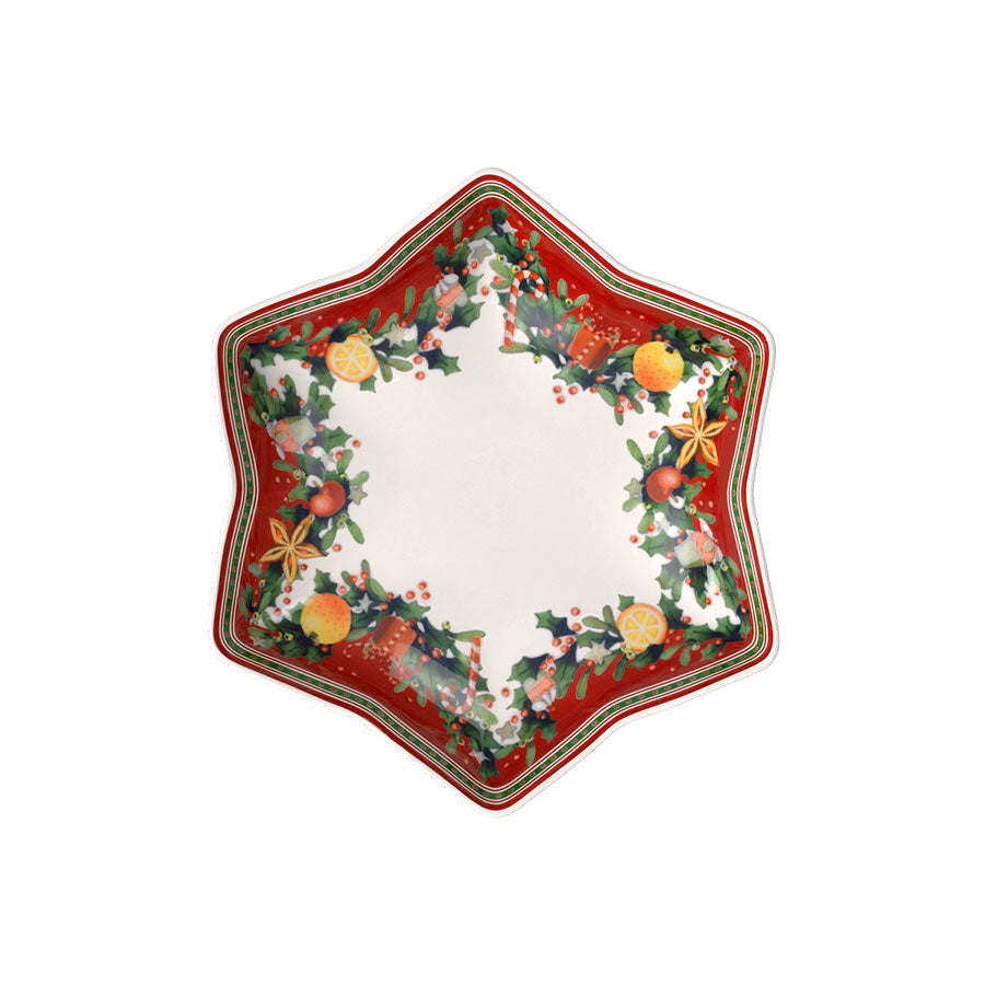 Villeroy & Boch stjerneformet serveringsfat med juledekor, ideal for pynting av bordet til jul, med detaljer av røde og grønne julemotiver.